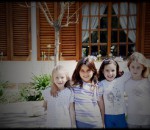 Kids in front of a house